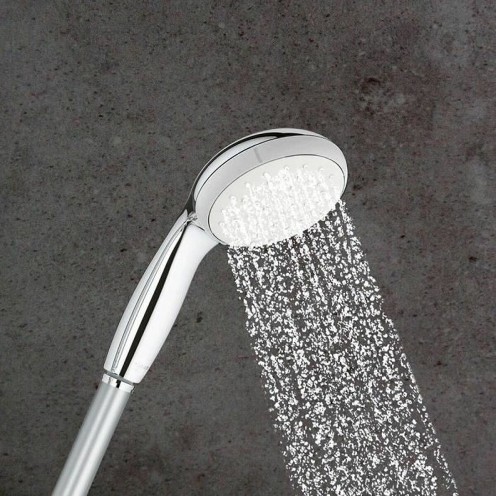 A shower head with a hose to direct the flow Grohe 26198000 1 Position