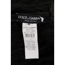 Dolce & Gabbana Eleganter schwarzer Pullover aus Wolle und Kaschmir mit Fransen