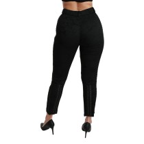 Dolce & Gabbana Elegante hochtaillierte Skinny-Hose aus schwarzem Brokat