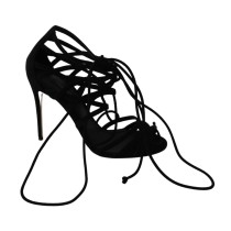 Dolce & Gabbana Elegante schwarze Stiletto-Sandalen mit Knöchelriemen aus Wildleder