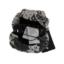 Dolce & Gabbana Elegante Haarspange mit schwarzer und weißer Blumenspitze und Kristall