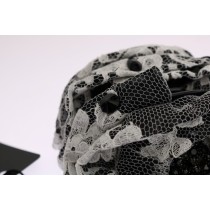 Dolce & Gabbana Elegante Haarspange mit schwarzer und weißer Blumenspitze und Kristall