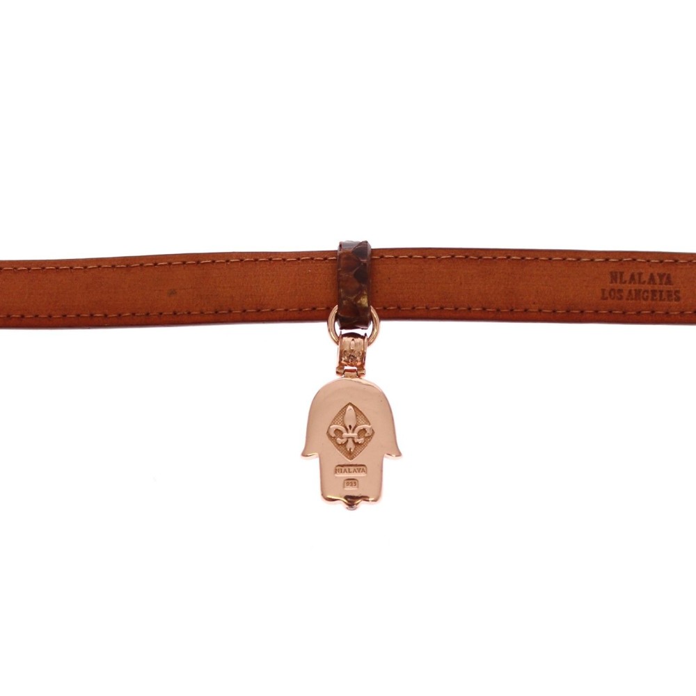 Nialaya Schickes Manschettenarmband aus Schlangenhaut und Gold
