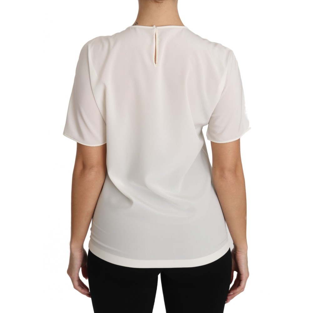 Dolce & Gabbana Elegante Seidenbluse mit Rundhalsausschnitt und Applikationen