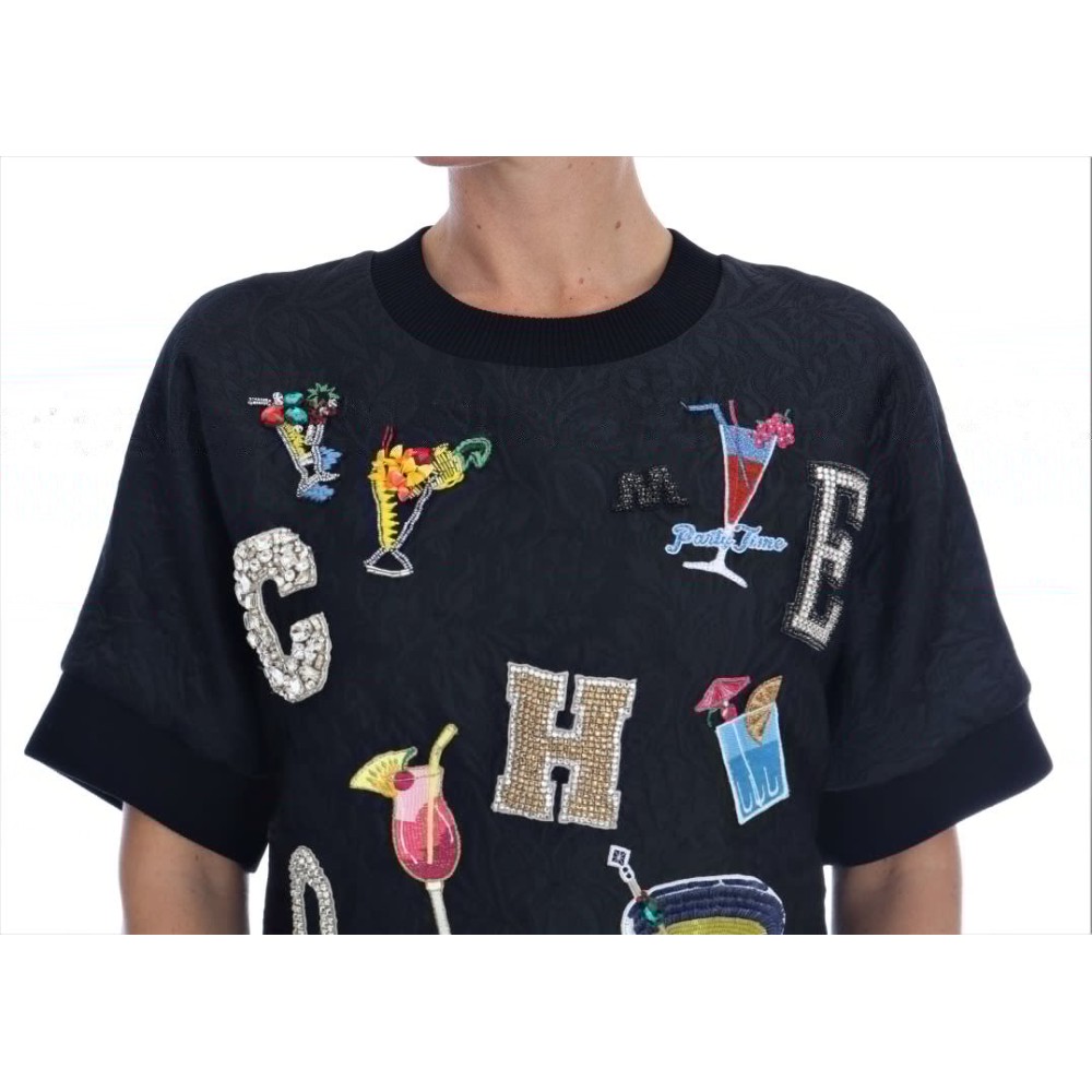 Dolce & Gabbana Schwarzer Pullover mit verzauberten Kristallen
