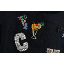 Dolce & Gabbana Schwarzer Pullover mit verzauberten Kristallen