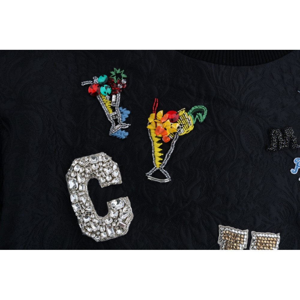 Dolce & Gabbana Schwarzer Pullover mit verzauberten Kristallen