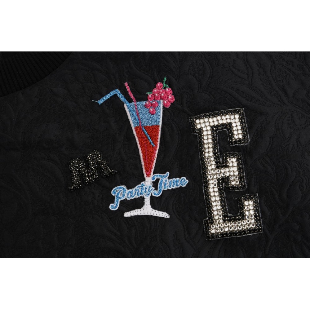 Dolce & Gabbana Schwarzer Pullover mit verzauberten Kristallen