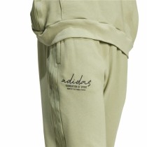 Lange Sporthose Adidas Brand Love French Terry grün Herren